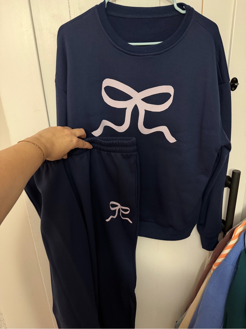 Women's Navy Crewneck Sweater with Pink Bow Graphic